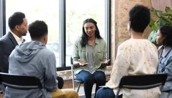 A mental health professional guides clients through counselling, representing the future of mental health in Australia.